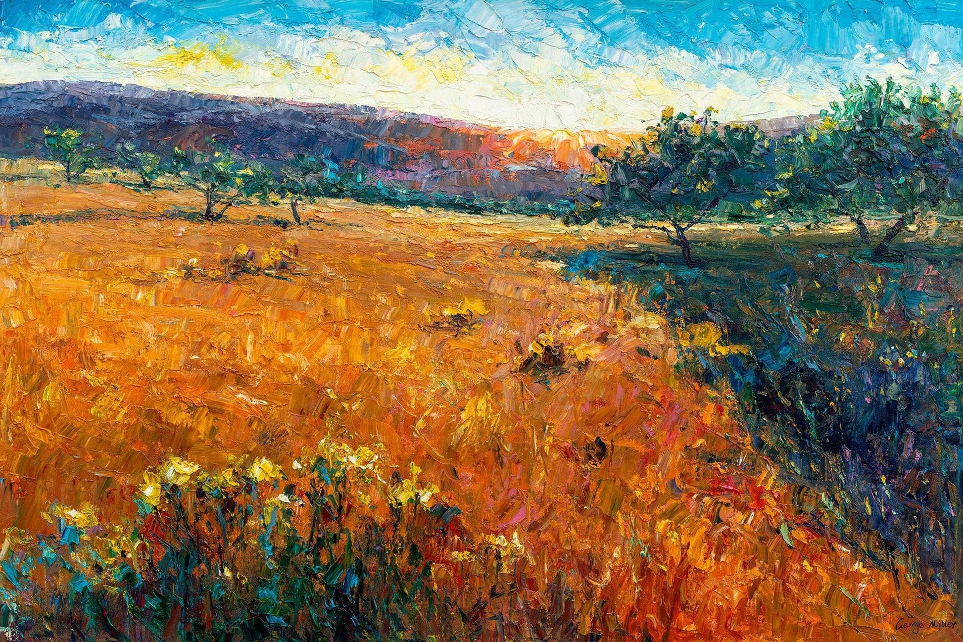 Original large oil painting 'Tuscany Sunset' by George Miller features a sun-drenched Tuscan landscape with bold impasto brushstrokes. Golden wheat fields and wildflowers dominate the foreground, framed by olive trees. The background showcases rolling hills under a vibrant sky in cobalt blue, lemon yellow, and fiery orange. Thick textured paint creates dynamic light/shadow interplay, evoking rustic warmth. Modern wall art with vivid contemporary aesthetics.