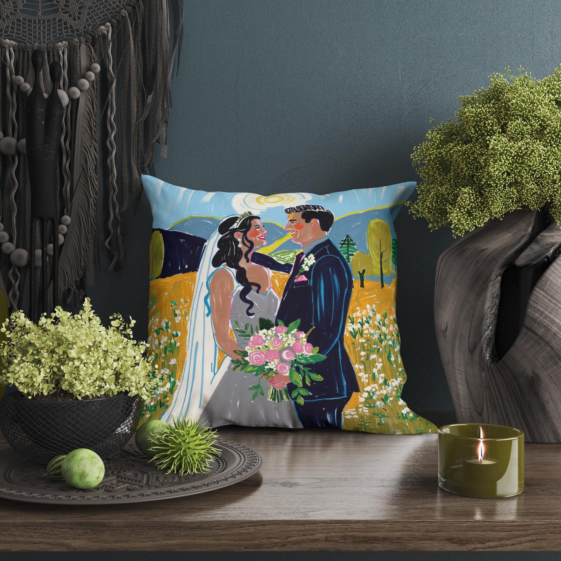 Square pillow with a couple in a flower - filled field. Whimsical style, soft, prominent decor piece.