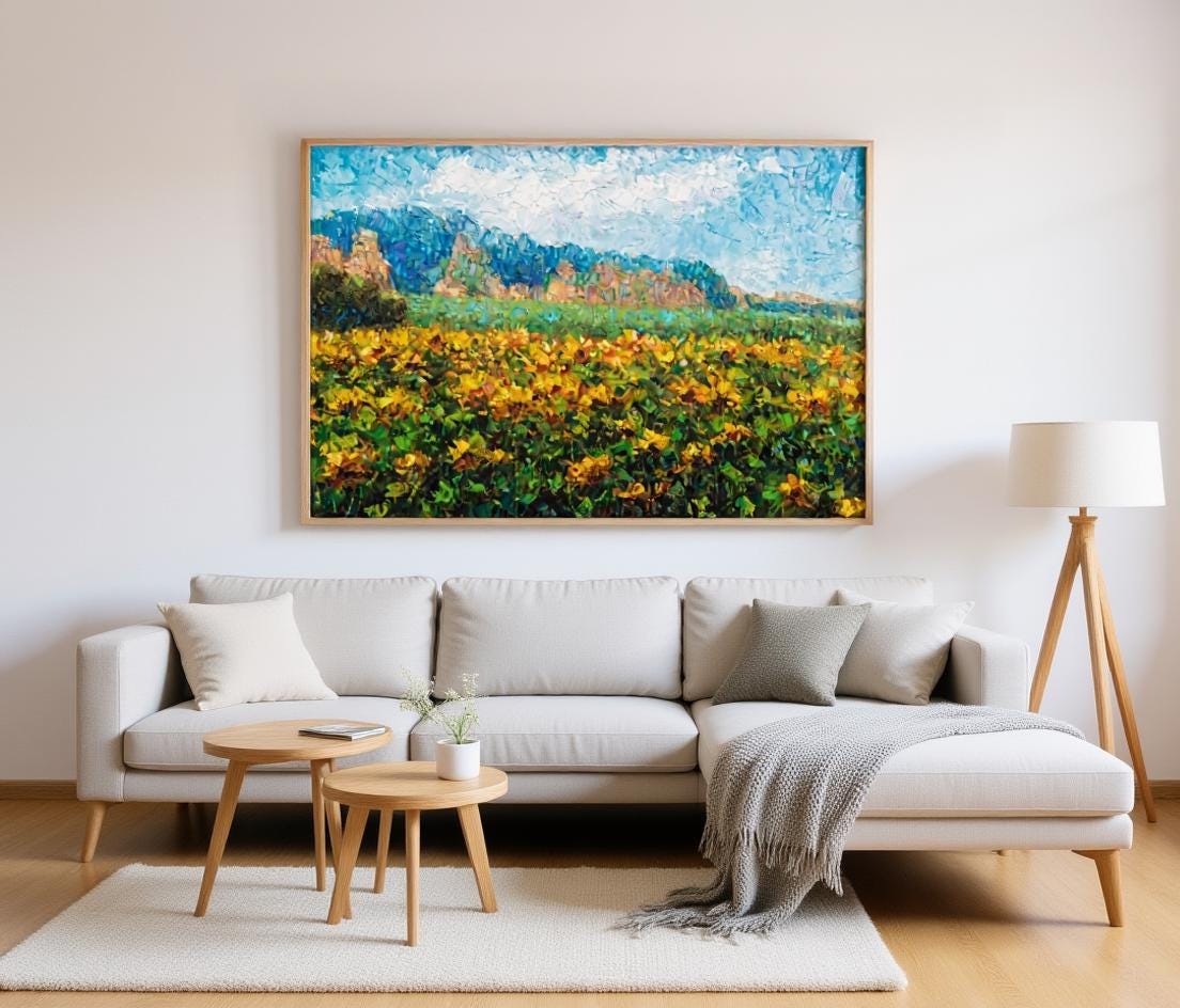 George Miller's "Sunflowers Beneath the Cliffs" enhances a modern living room with its cheerful colors and natural theme. This painting adds warmth and an artistic focal point to the minimalist décor, creating an inviting and stylish space.