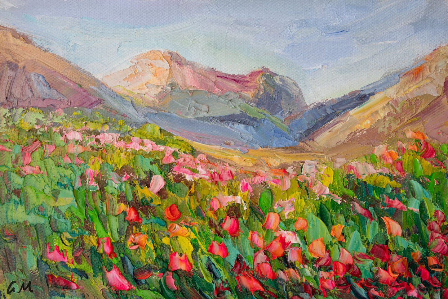 Hand-painted oil landscape of a vibrant poppy meadow with distant mountains, unframed canvas on neutral surface, rich textures and bold colors