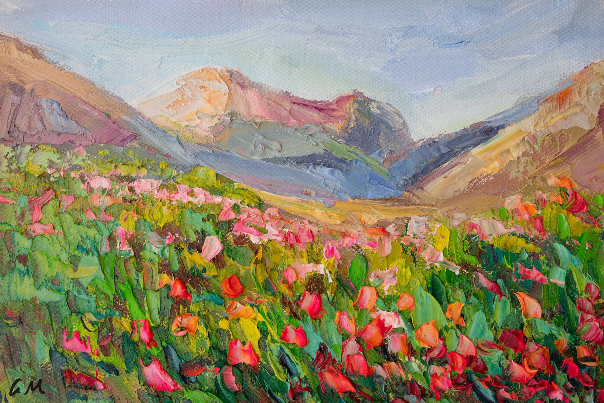 Hand-painted oil landscape of a vibrant poppy meadow with distant mountains, unframed canvas on neutral surface, rich textures and bold colors