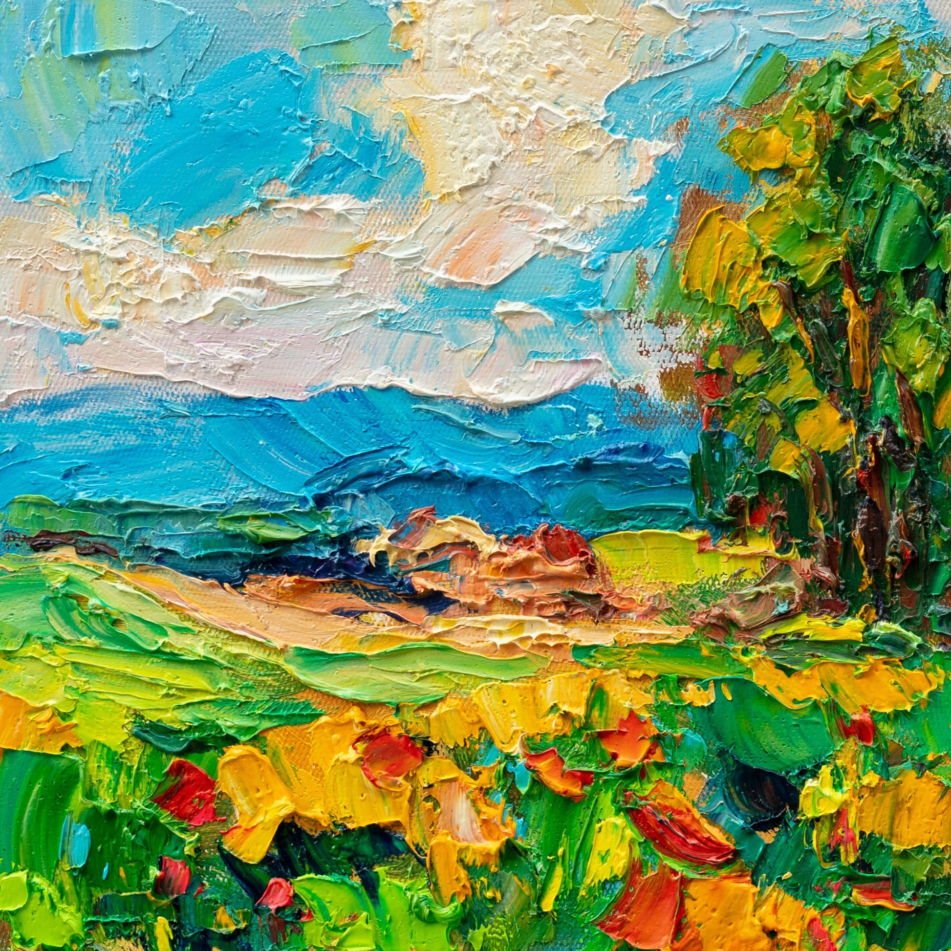 Unframed oil painting of a vibrant coastal landscape with textured brushwork in blue, green, and yellow hues on cotton canvas