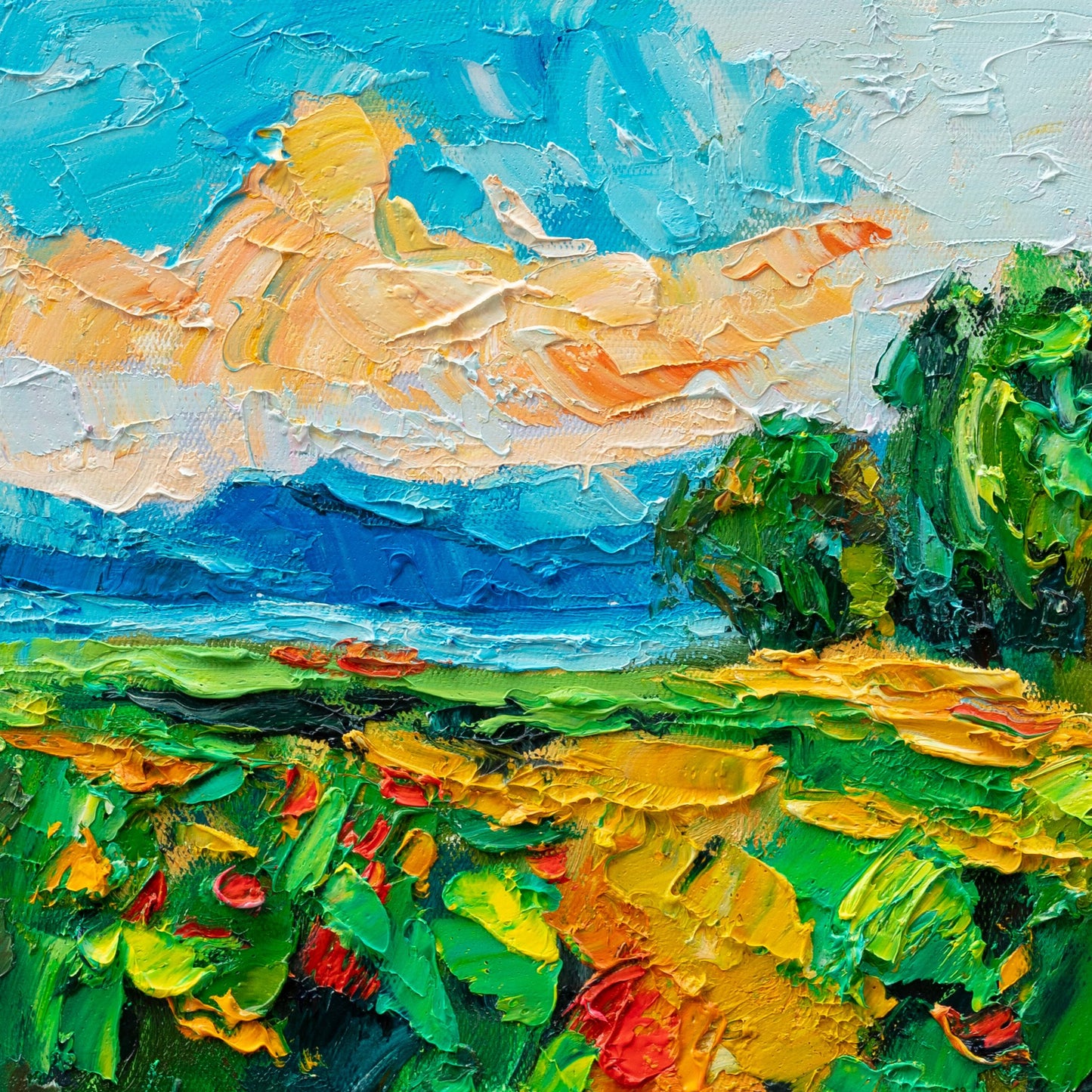 Impasto oil painting of a vibrant floral field at sunset with thick textured brushstrokes, unframed canvas on neutral surface