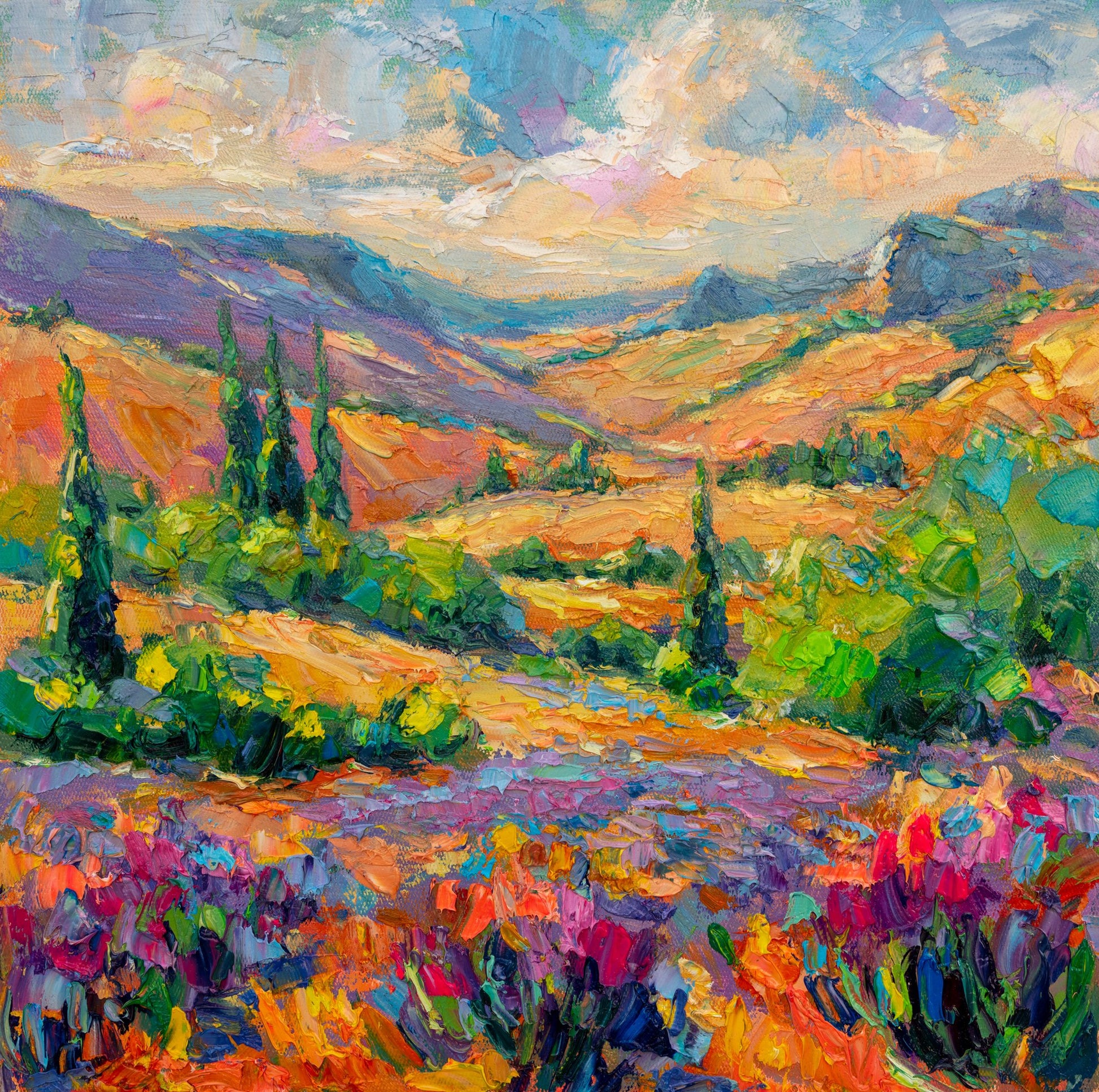 Vibrant oil painting of a colorful autumn meadow with rolling hills, cypress trees, and wildflowers under a soft sky; unframed canvas on neutral surface
