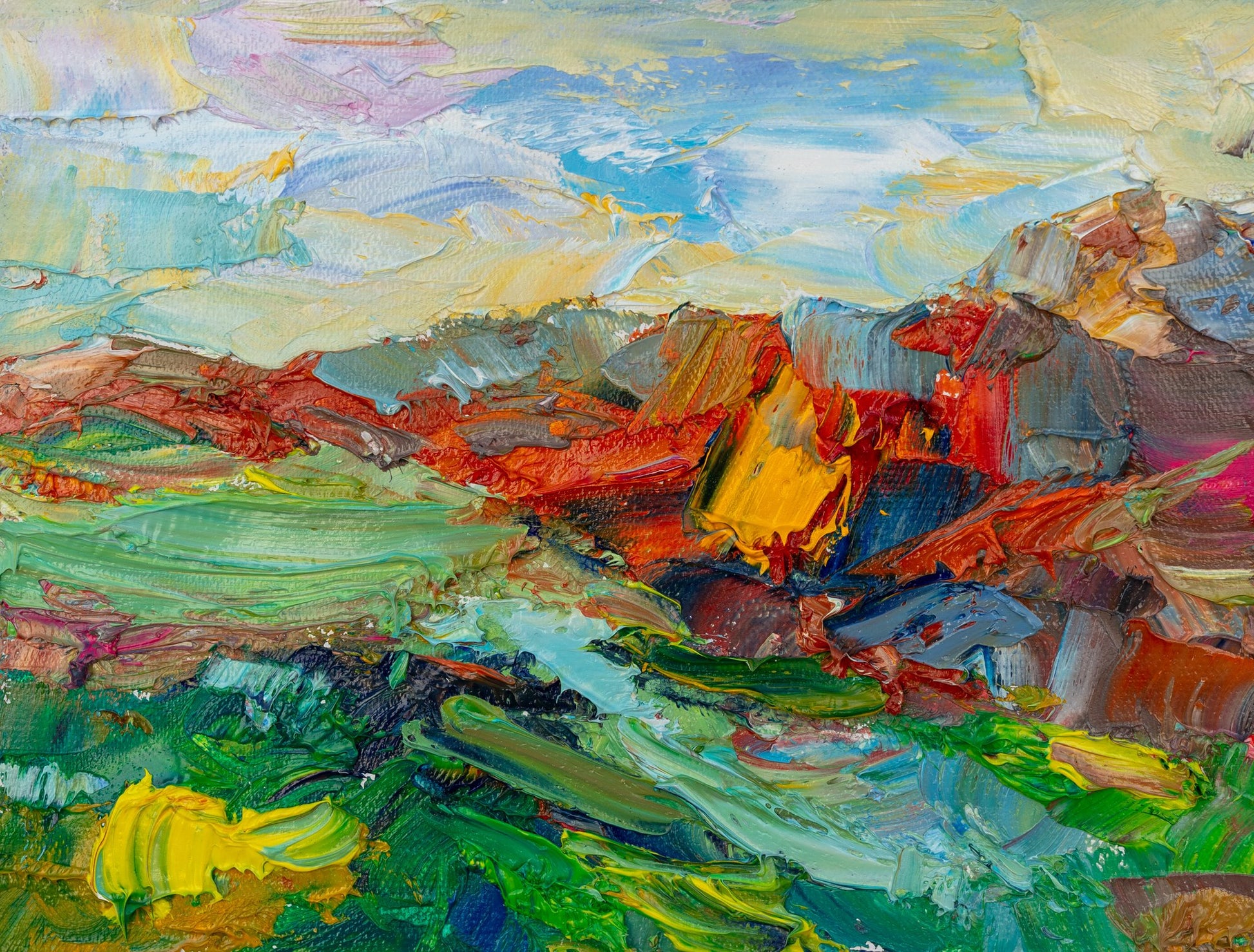 Expressive oil painting of a vibrant mountain landscape with bold brushstrokes in green, red, and blue; unframed canvas on neutral surface