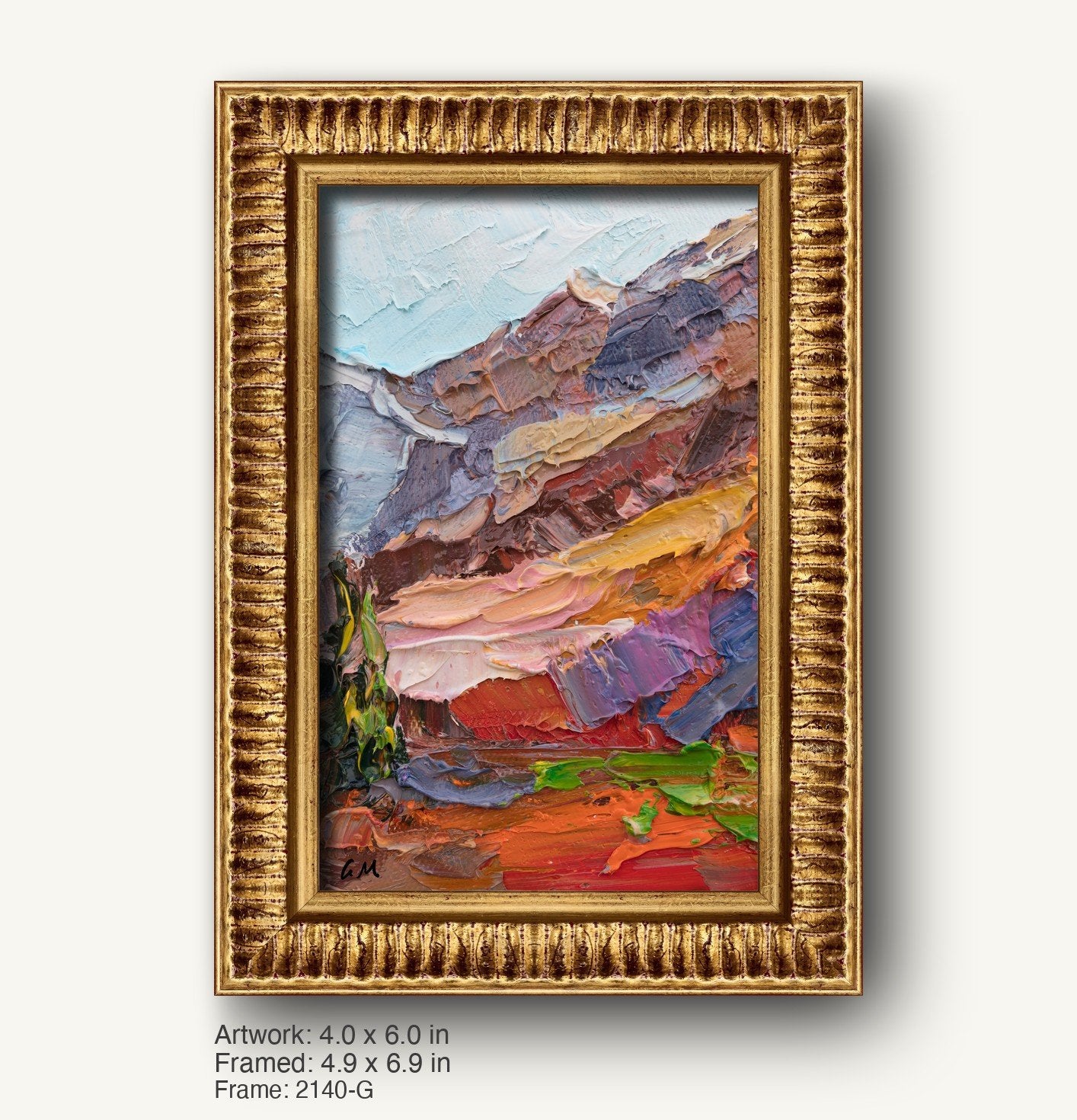 Vertical oil painting of a vibrant canyon landscape in warm reds, oranges, and blues, framed in an ornate gold-toned frame with textured ridged profile
