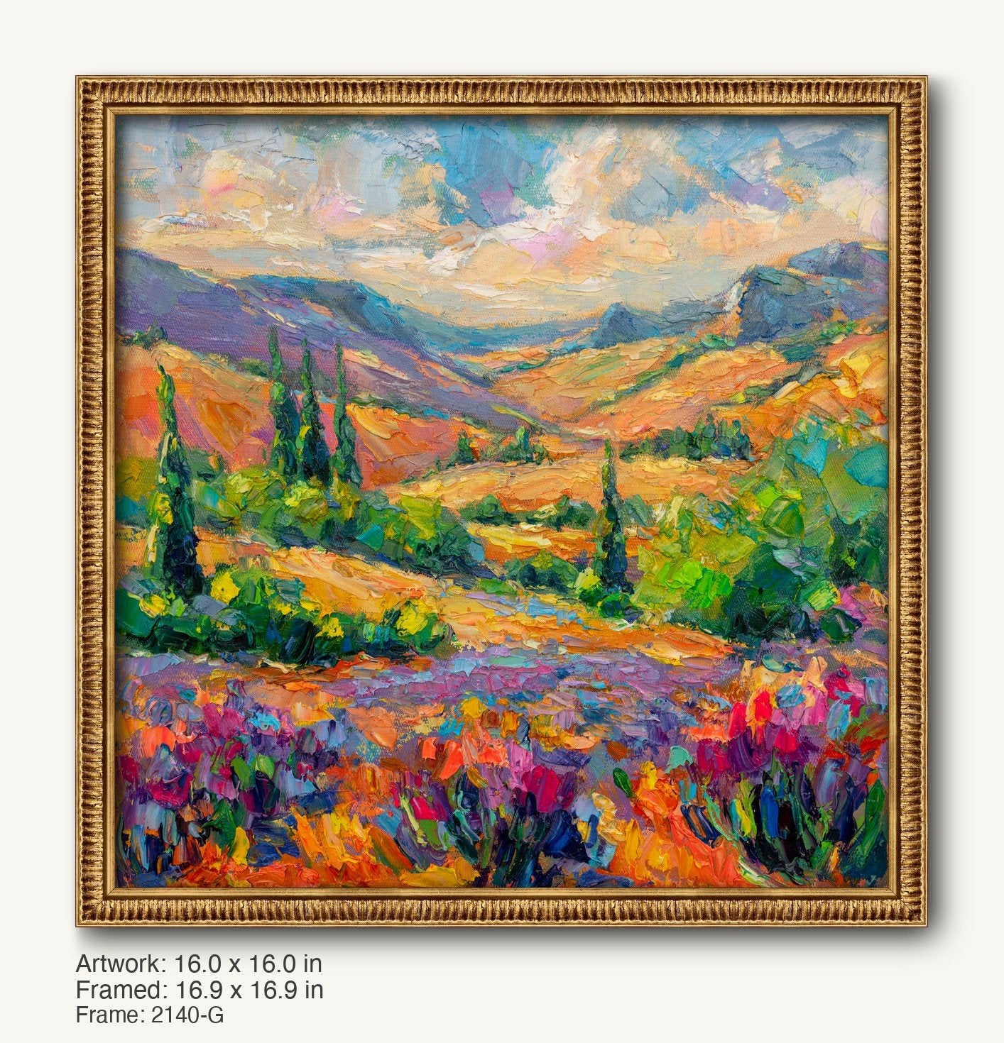 Vibrant autumn meadow landscape painting in a warm gold ornate frame, featuring rolling hills, colorful wildflowers, and distant mountains under a soft sky