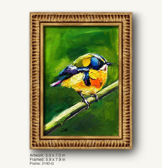 Vibrant hand-painted bird perched on a branch, set in a warm gold ornate frame with textured profile, against a lush green background