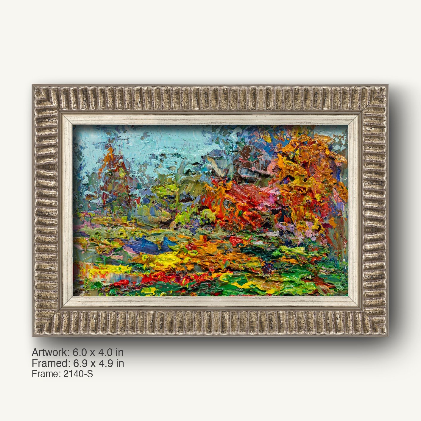 Hand-painted abstract landscape in a textured silver-gray ornate frame, featuring vibrant blues, greens, yellows, reds, and oranges on canvas with visible brushwork