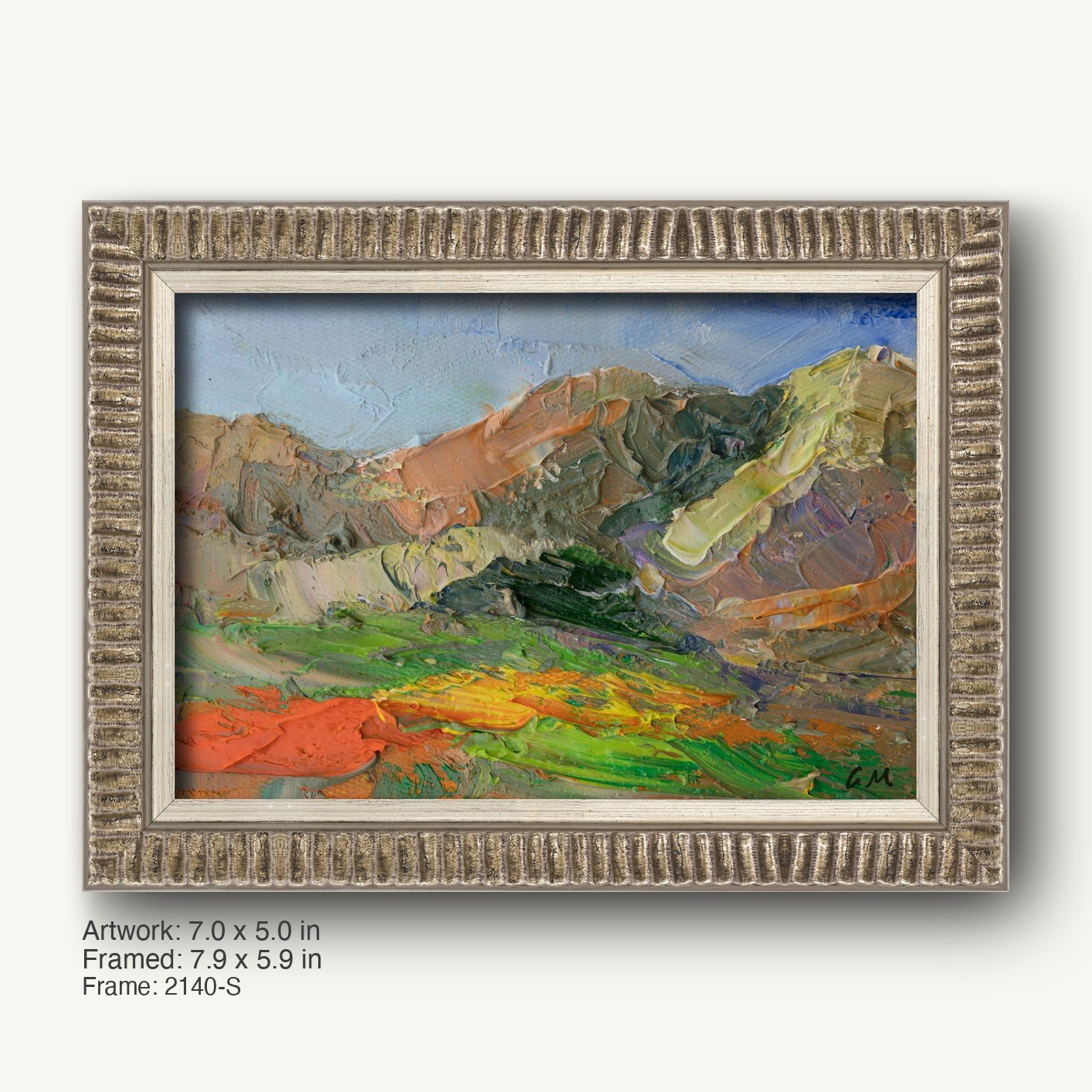 Vibrant desert canyon landscape painting in a textured silver frame with ribbed profile, showcasing bold orange, green, and blue hues on canvas