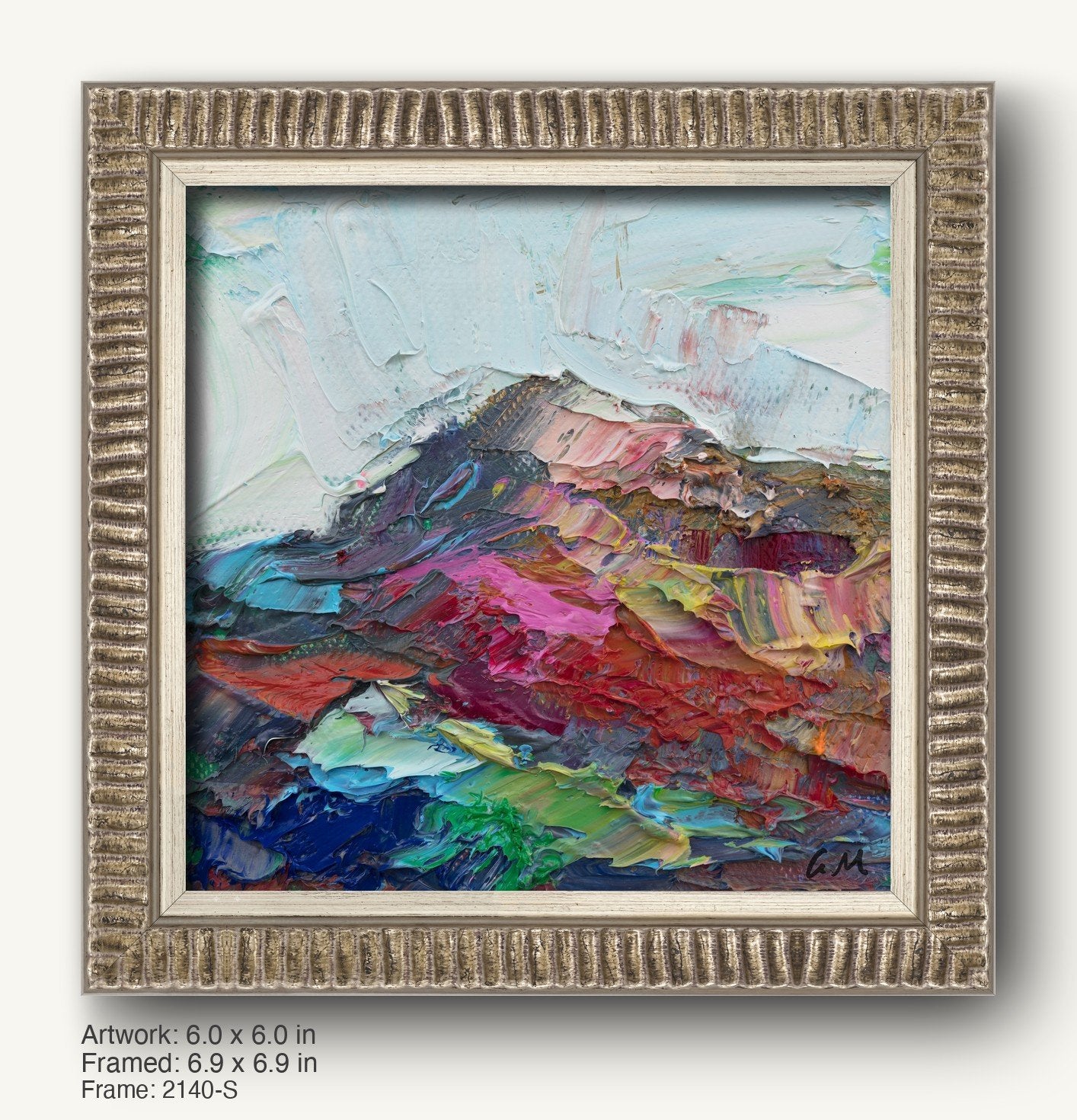 Textured abstract landscape painting in a silver-toned ornate frame with ribbed profile, featuring bold red, blue, and green hues on canvas
