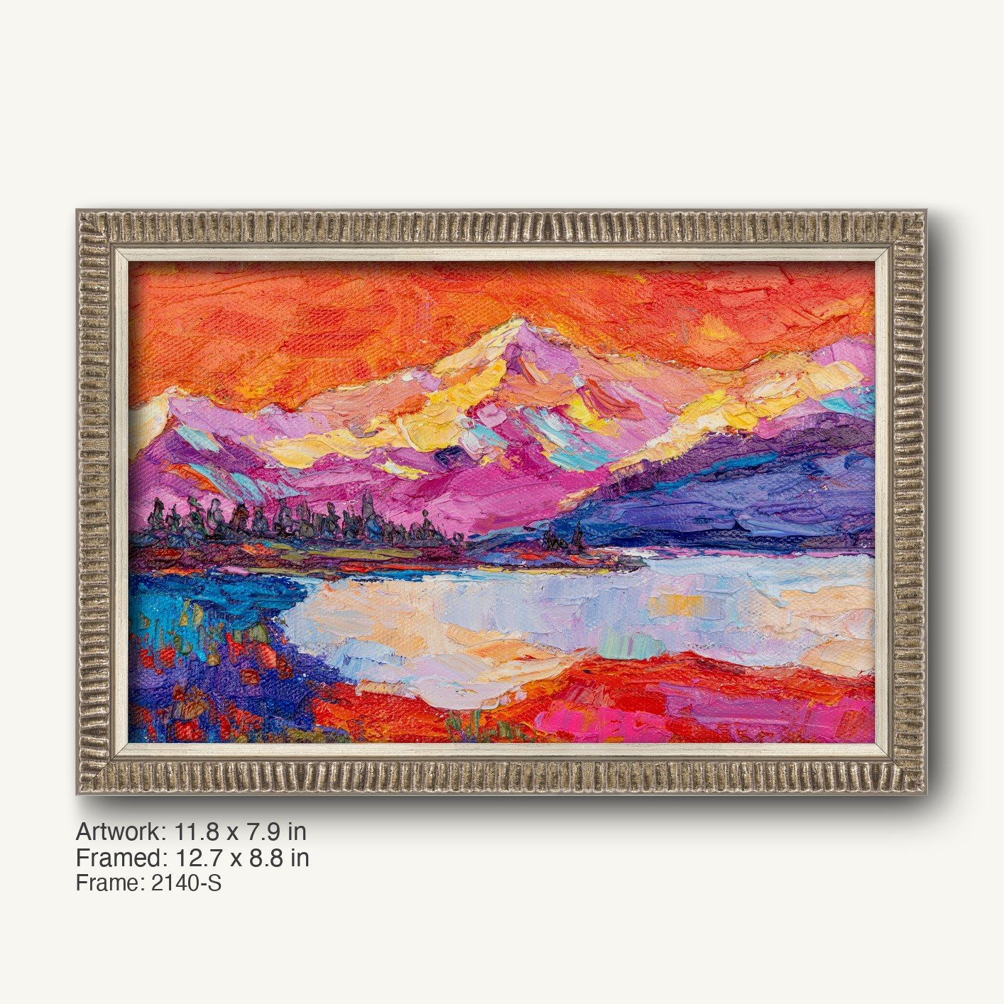 Hand-painted mountain sunset on canvas in a silver ornate frame, featuring vibrant red, purple, and blue hues with textured brushwork and reflective lake below.