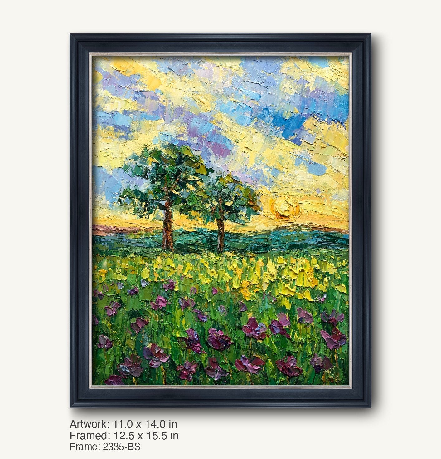 Hand-painted spring meadow landscape in a dark wood frame with silver inner liner, featuring vibrant green and yellow fields, purple flowers, two trees, and a dynamic sky