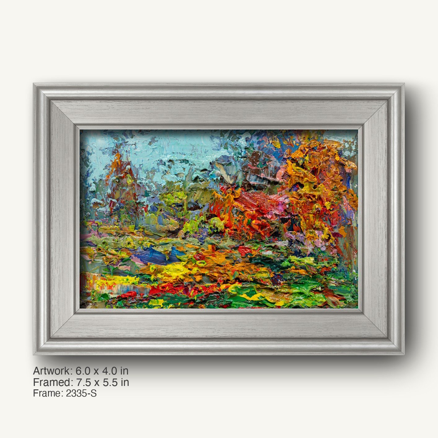 Hand-painted abstract landscape in a cool silver modern slim frame, featuring vibrant blues, greens, yellows, reds, and oranges on canvas with textured oil brushwork