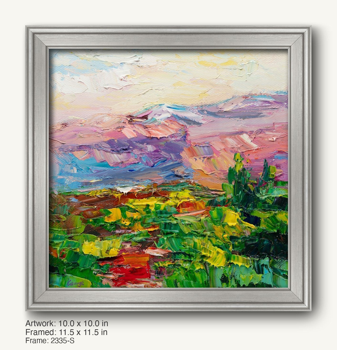 Vibrant oil painting of a desert sunset with layered mountains and colorful landscape, displayed in a modern slim silver frame with clean edges and subtle texture.
