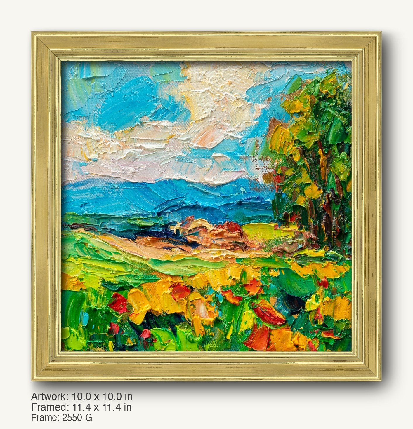 Vibrant coastal landscape oil painting in warm gold ornate frame, featuring textured brushwork with blue sky, green fields, and yellow flowers