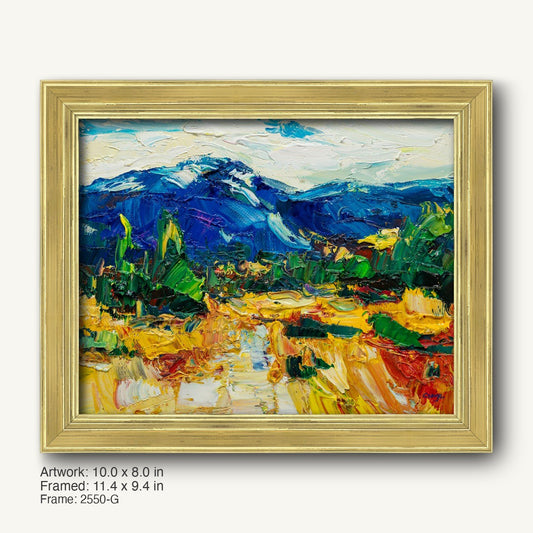 Palette knife oil painting of a vibrant mountain landscape in a warm gold ornate frame, featuring bold blues, greens, and yellows on canvas