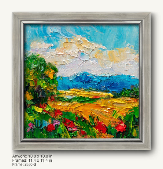 Textured oil painting of a vibrant mountain meadow with bold blues, greens, and yellows, framed in a modern slim silver frame with subtle brushed finish