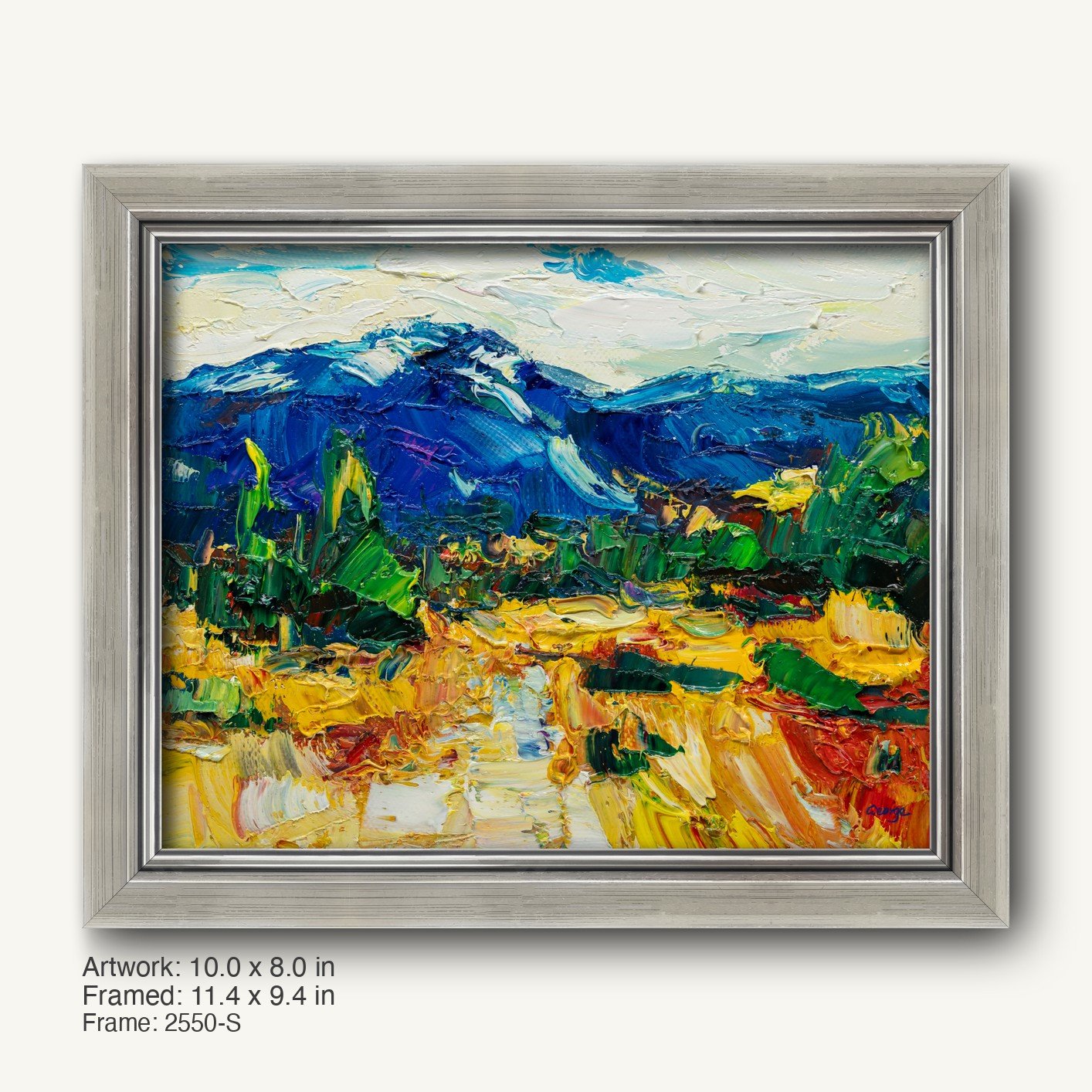 Vibrant oil painting of a mountain landscape with bold blue peaks, green trees, and golden fields, displayed in a sleek silver frame with a modern slim profile.