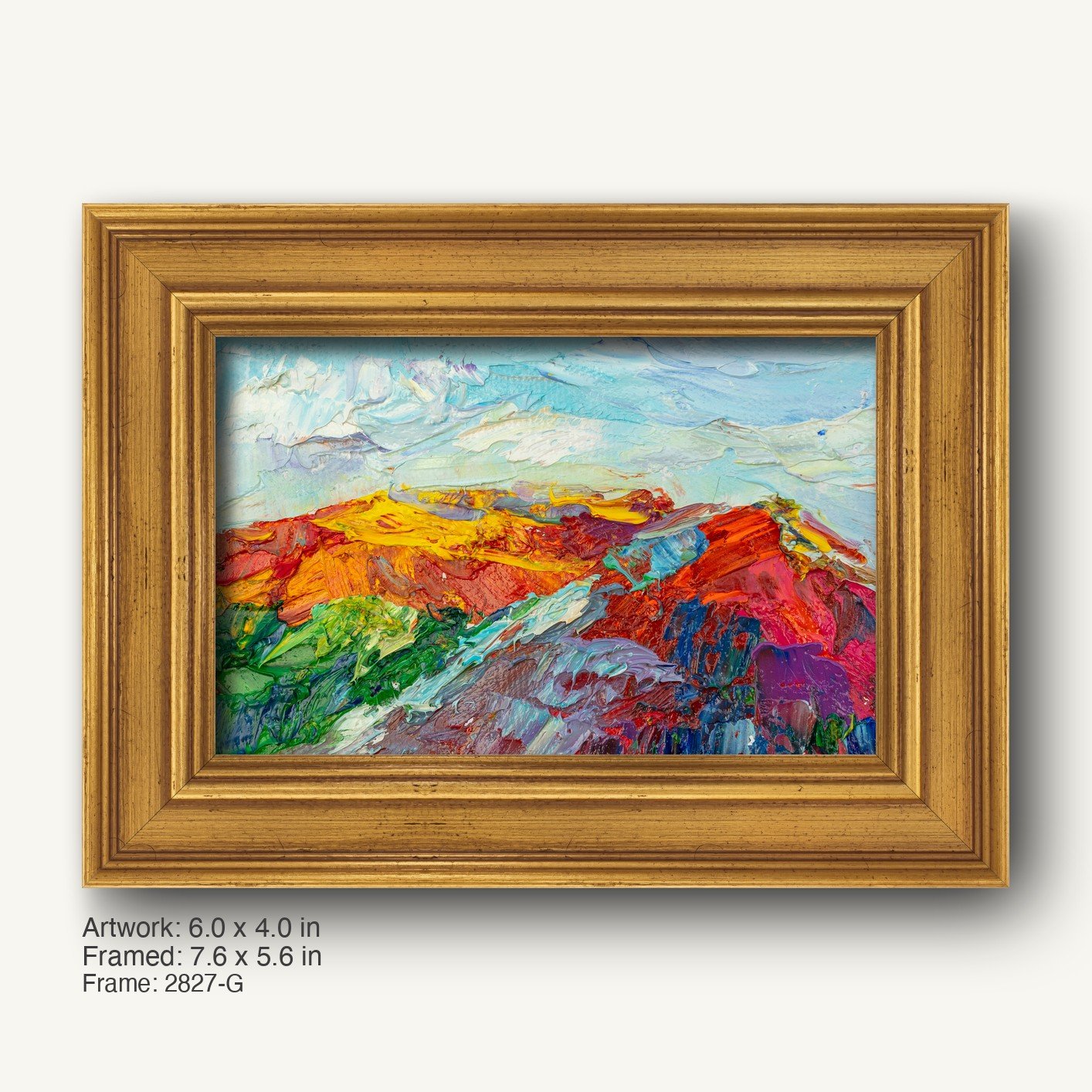 Abstract landscape oil painting in warm gold ornate frame, vibrant colors of red, yellow, green, and blue depict expressive mountains under a textured sky