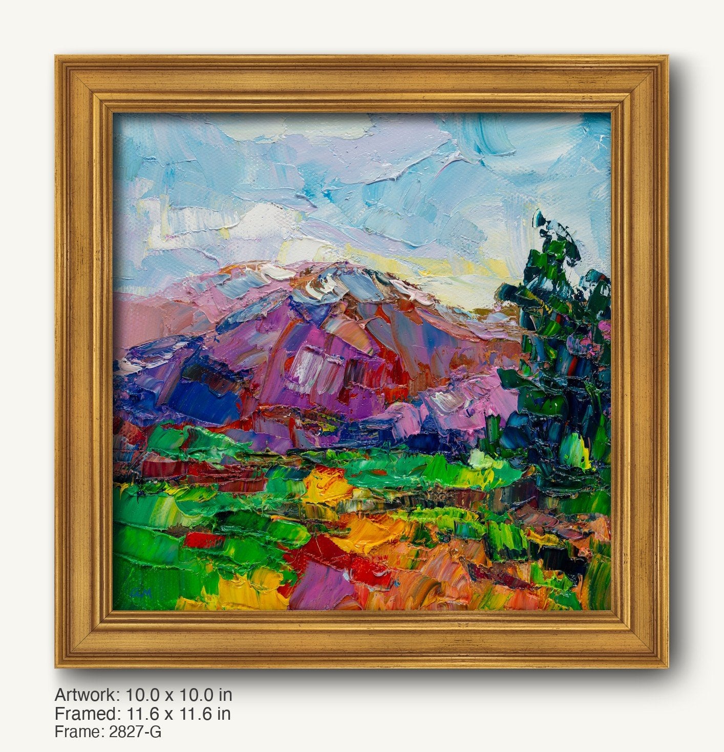 Vibrant autumn mountain landscape painting in a warm gold ornate frame, featuring expressive brushstrokes and rich hues of green, purple, and blue