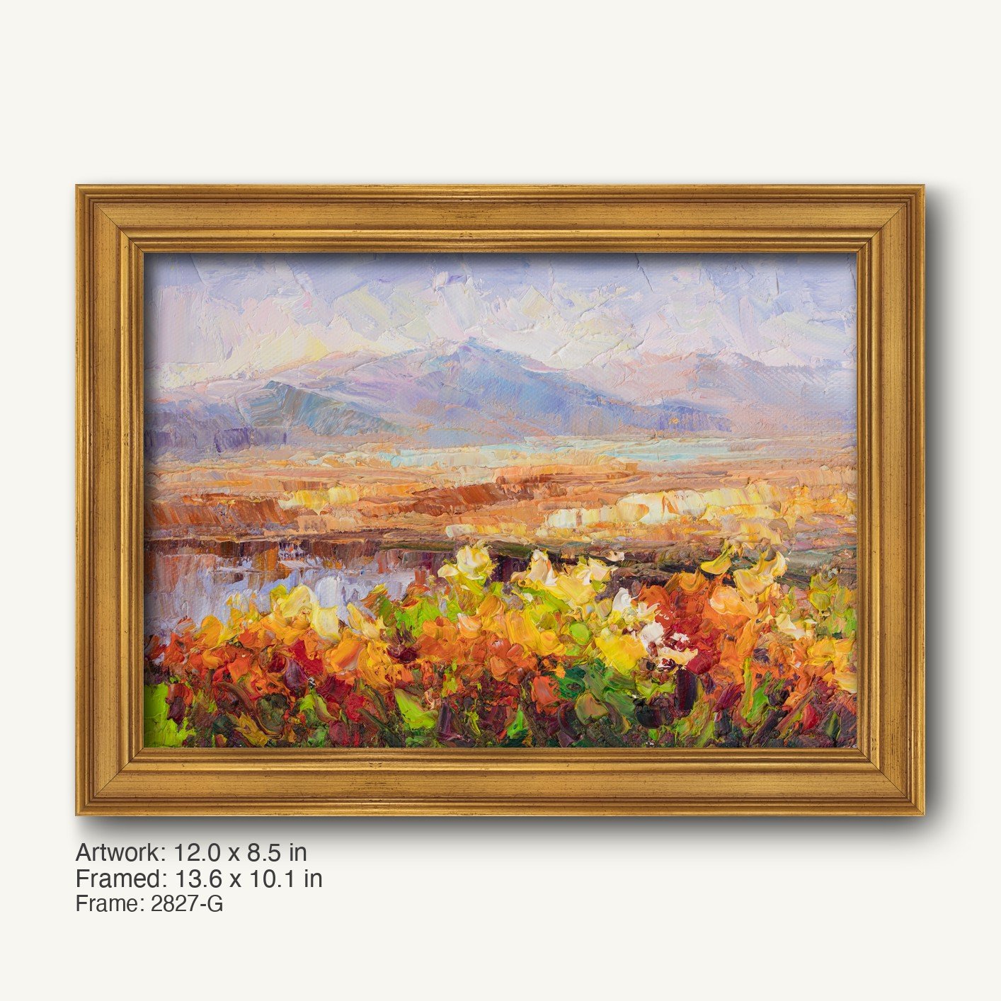 Sunset Desert Bloom oil painting in warm gold ornate frame, horizontal landscape with vibrant floral foreground and distant mountains