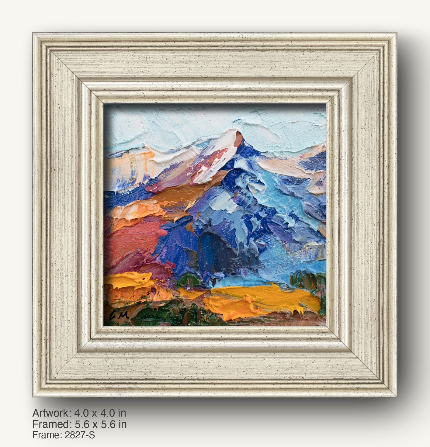 Abstract mountain landscape oil painting in a textured off-white frame with layered profile, showcasing bold blue, red, and yellow hues on canvas