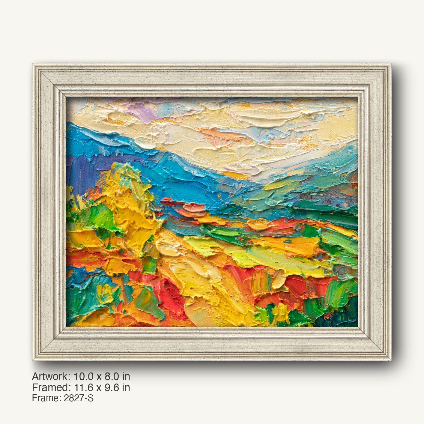 Vibrant abstract landscape painting with thick impasto oil texture in blue, yellow, green, red, and white, displayed in a cool silver-toned classic frame with subtle wood grain finish