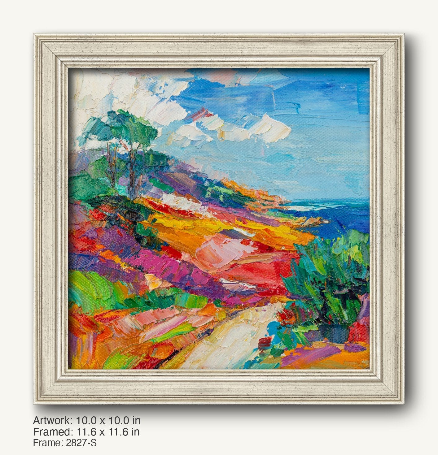 Vibrant hand-painted coastal landscape in a white-washed wooden frame, featuring bold blues, greens, and yellows with textured oil brushwork on canvas