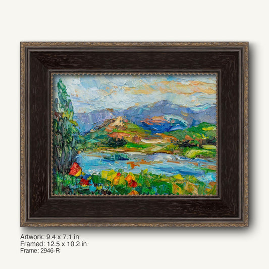 Impasto oil painting of a mountain river landscape in a dark wood frame with gold accents, horizontal composition, vibrant blues, greens, and yellows