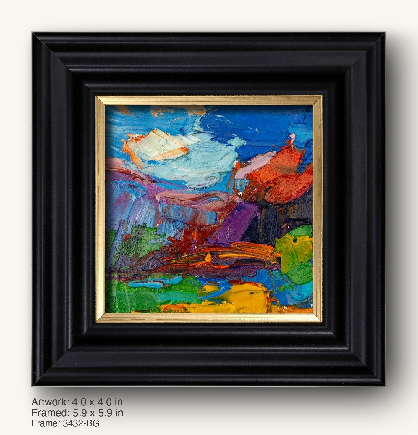Vibrant abstract oil painting in bold blues, reds, and greens, displayed in a black ornate frame with gold inner liner, creating a striking contrast against a neutral background.