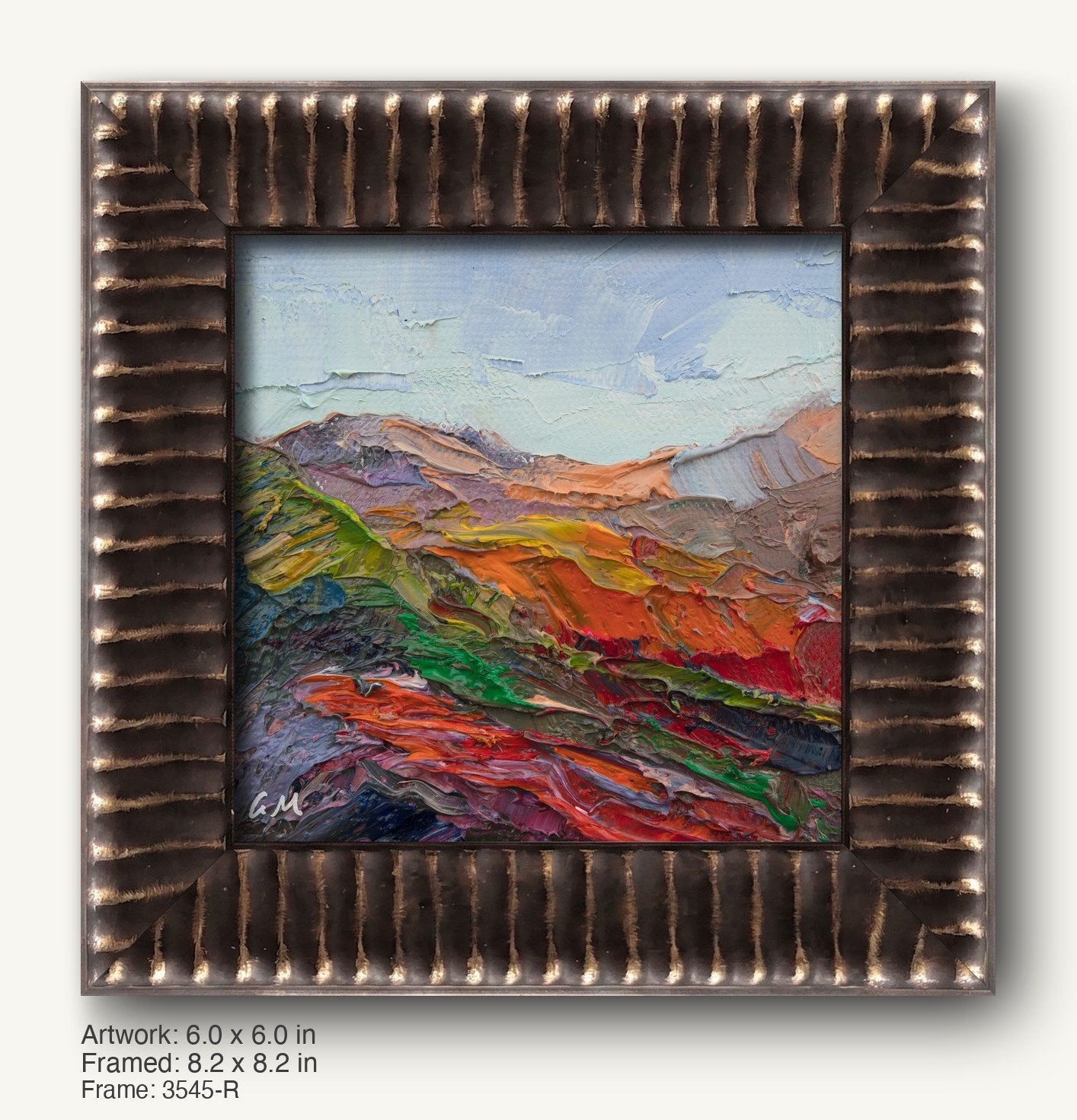 Vibrant impasto mountain landscape in oil on canvas, framed in a textured dark bronze frame with vertical ridges and gold highlights, showcasing bold reds, oranges, greens, and blues.