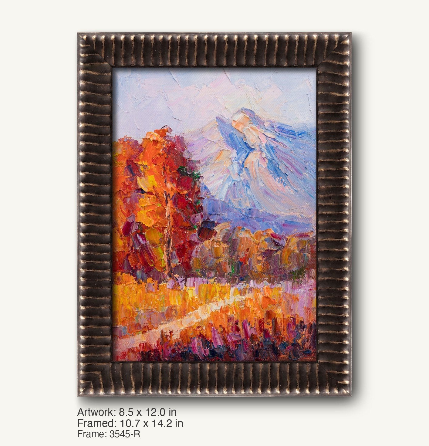 Vertical oil painting of autumn mountain landscape with vibrant orange and red trees, blue peaks, and textured brushwork, displayed in a dark wood frame with ridged profile and metallic accents