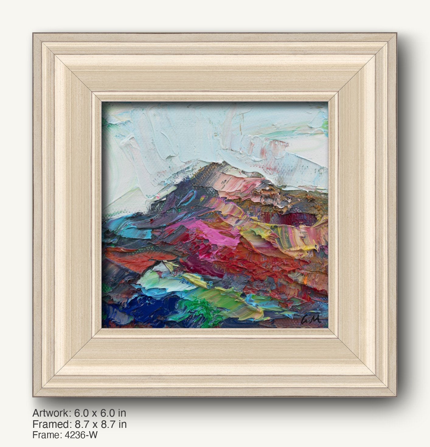 Textured abstract landscape painting in a light wood frame, featuring bold red, blue, and green hues with expressive brushwork and visible signature