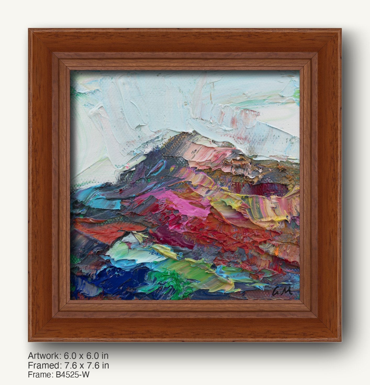 Textured abstract landscape painting in warm wood frame, featuring bold red, blue, and green hues with expressive brushwork and visible signature