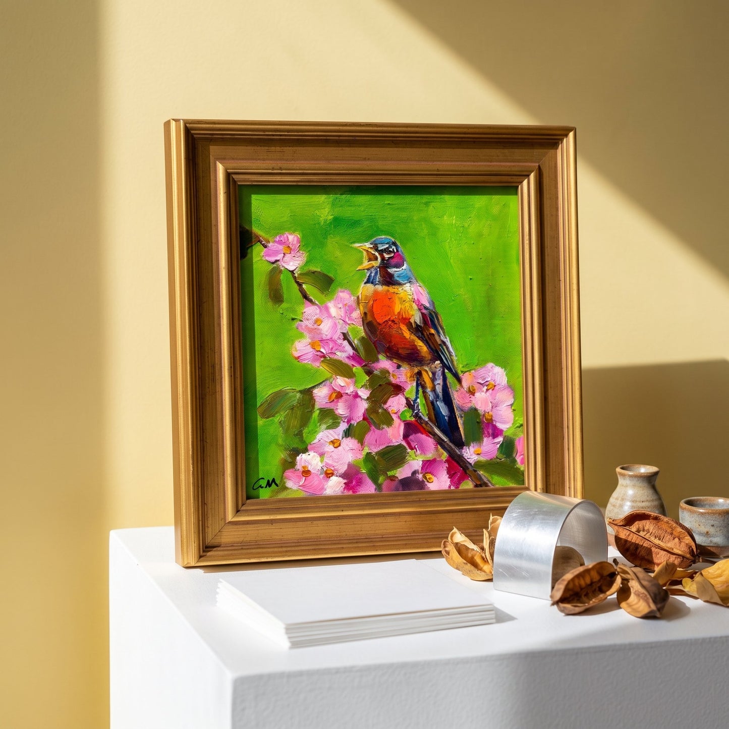 Minimalist living room — Vibrant Impressionist bird painting adds color and life to a serene space