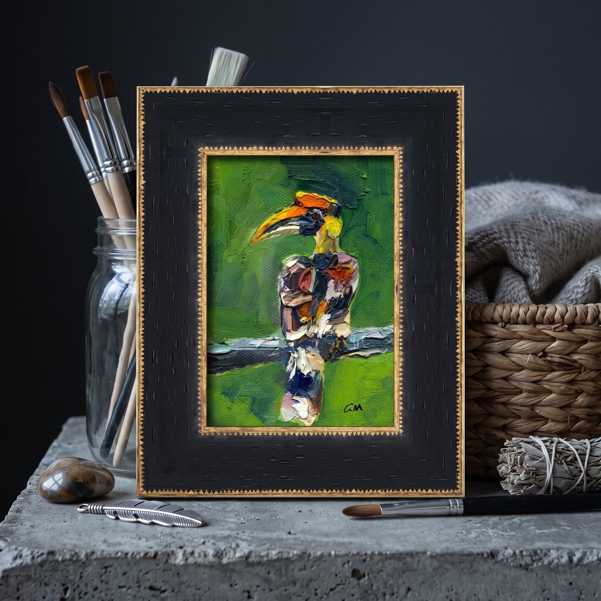 Minimalist studio — Expressive hornbill painting adds vibrant color and artistic energy to a serene creative workspace