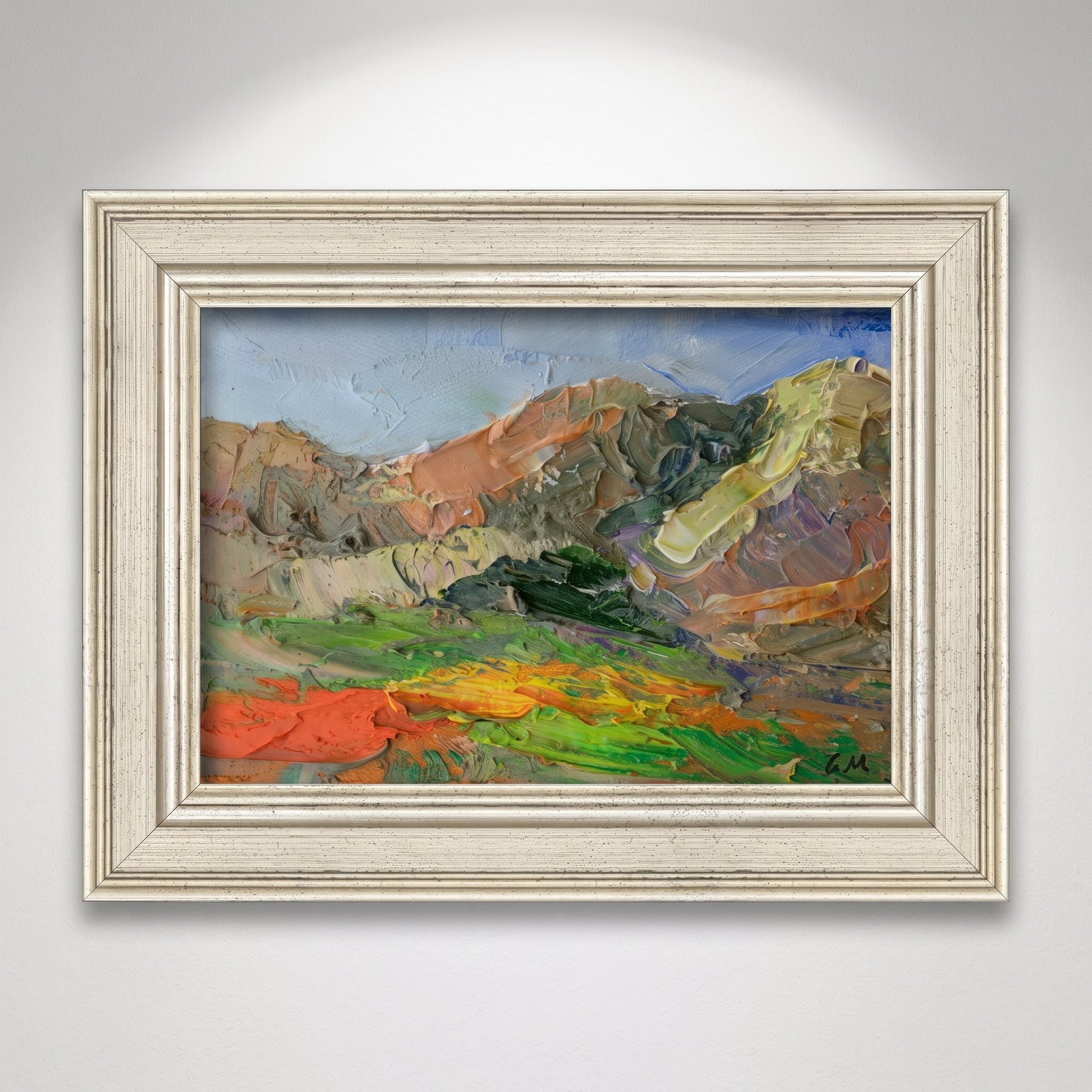 Minimalist living room — expressive landscape painting adds vibrant color and emotional depth to a serene space