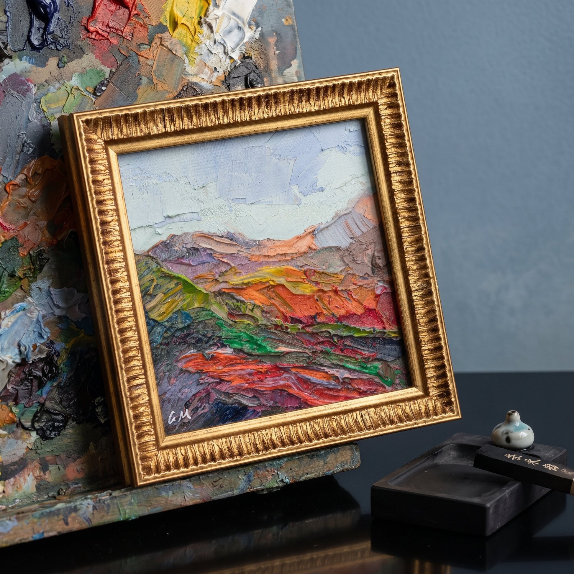 Contemporary art studio — expressive landscape painting adds vibrant energy and artistic depth to the creative space