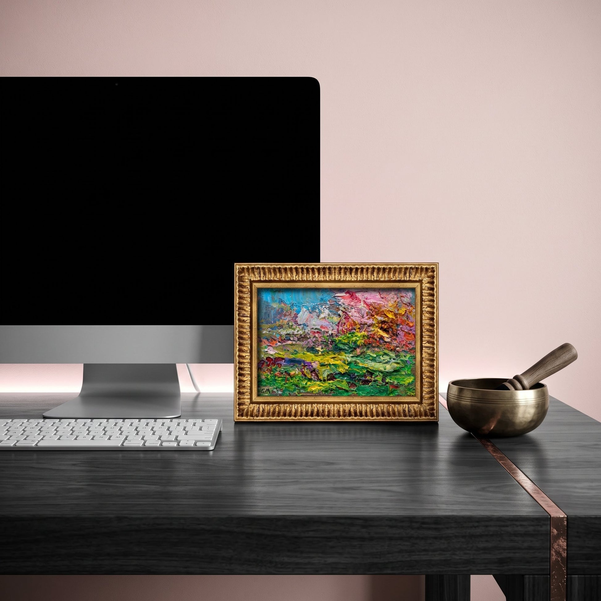 Minimalist home office — vibrant expressionist landscape painting adds artistic energy and color contrast to a serene workspace