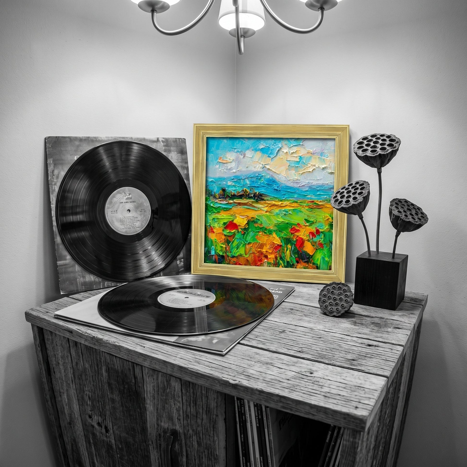 Eclectic living room — vibrant Impressionist landscape transforms rustic corner with color and texture