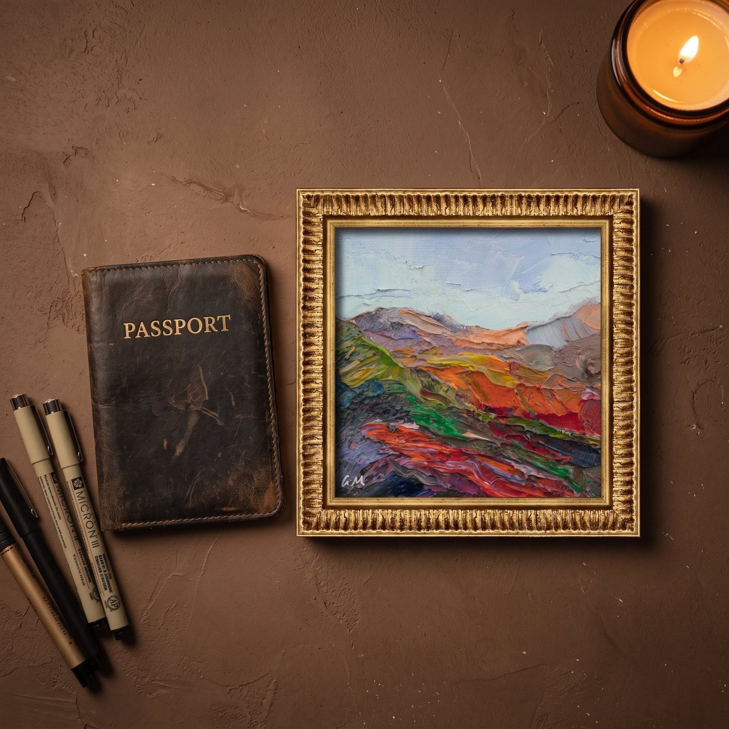 Study, rustic travel-inspired decor — vibrant Expressionist landscape transforms space with bold colors and emotional depth under warm candlelight