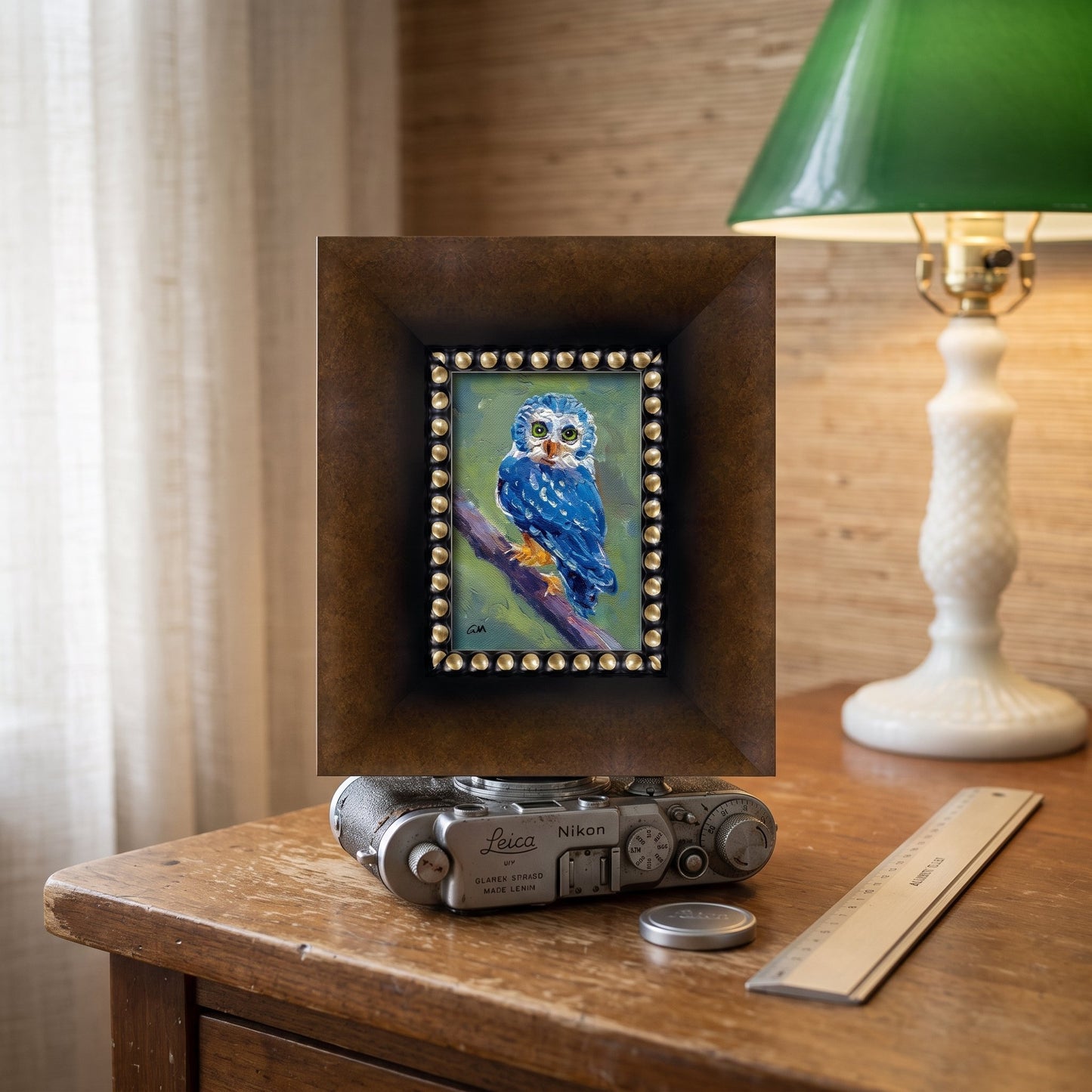 Rustic Farmhouse Study — Original expressionist owl painting adds vibrant color and artistic charm to a vintage-inspired workspace