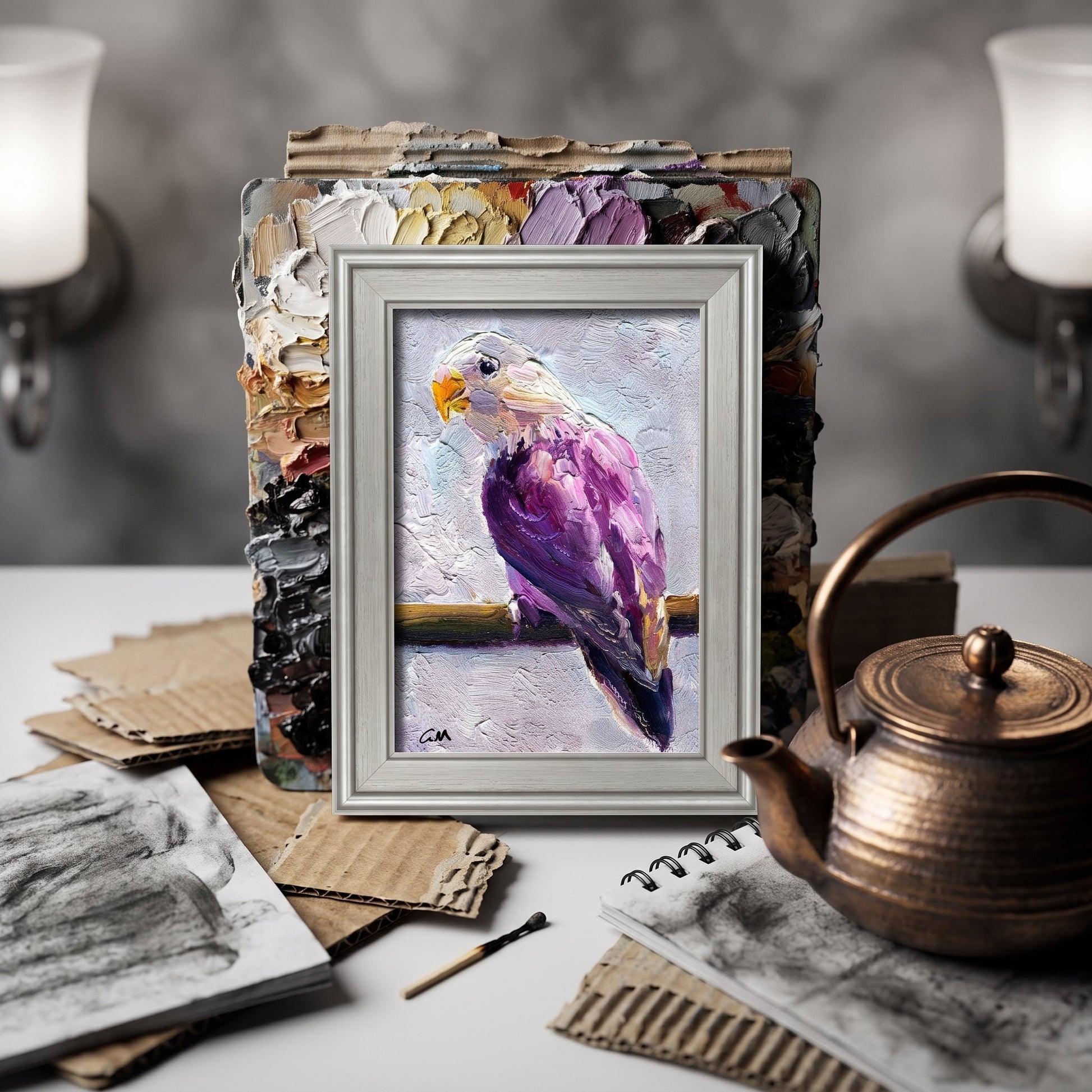 Artist's studio, eclectic decor — vibrant expressionist bird painting adds color and soul to creative workspace
