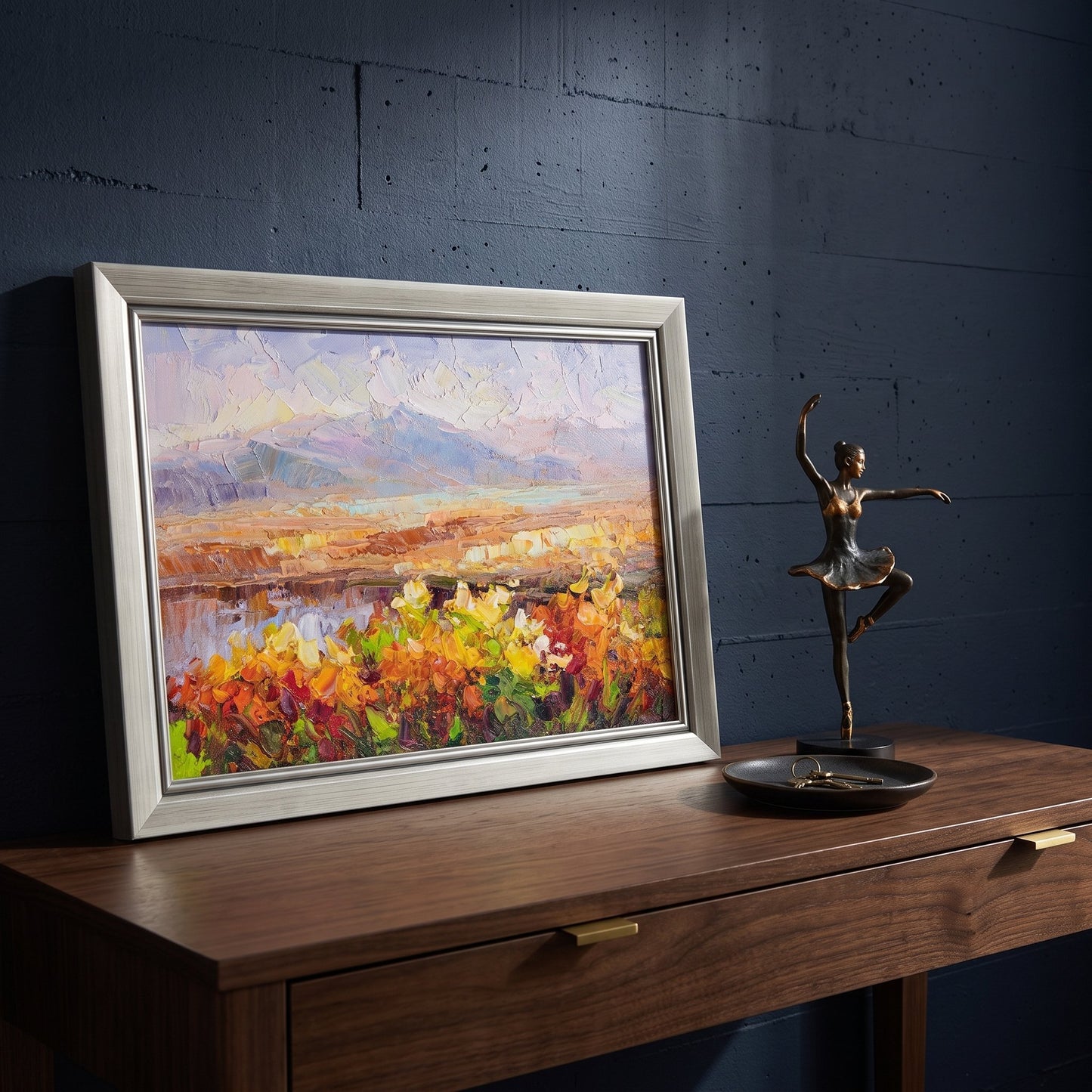 Contemporary entryway — vibrant Impressionist landscape adds warmth and color to minimalist industrial space