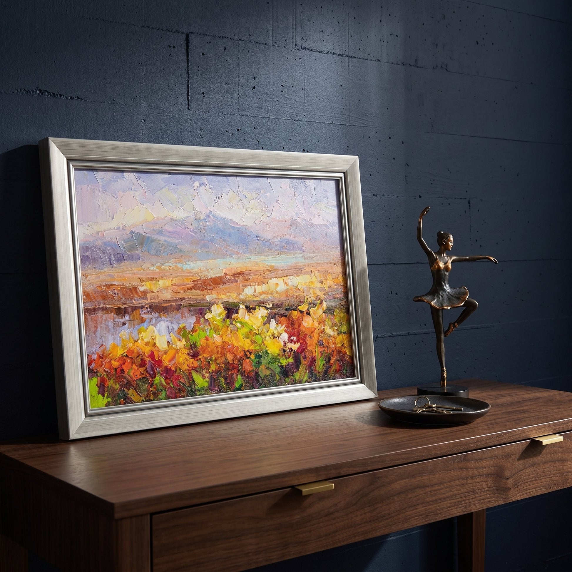 Contemporary entryway — vibrant Impressionist landscape adds warmth and color to minimalist industrial space