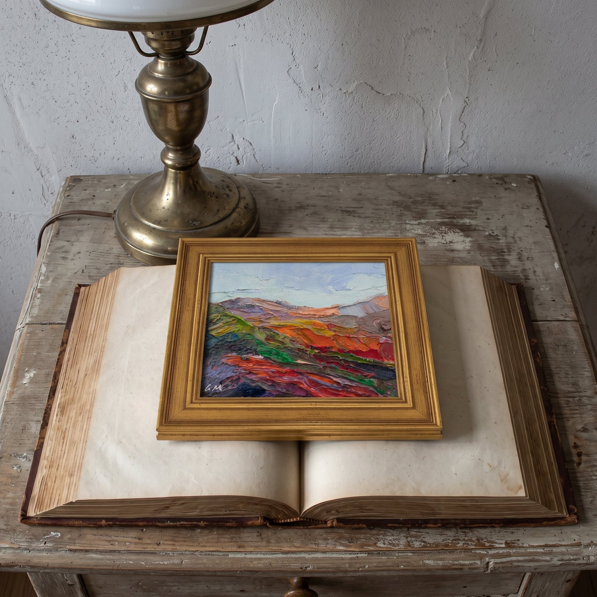 Rustic farmhouse study — vibrant Expressionist landscape painting adds bold color and emotion to a weathered, tranquil space