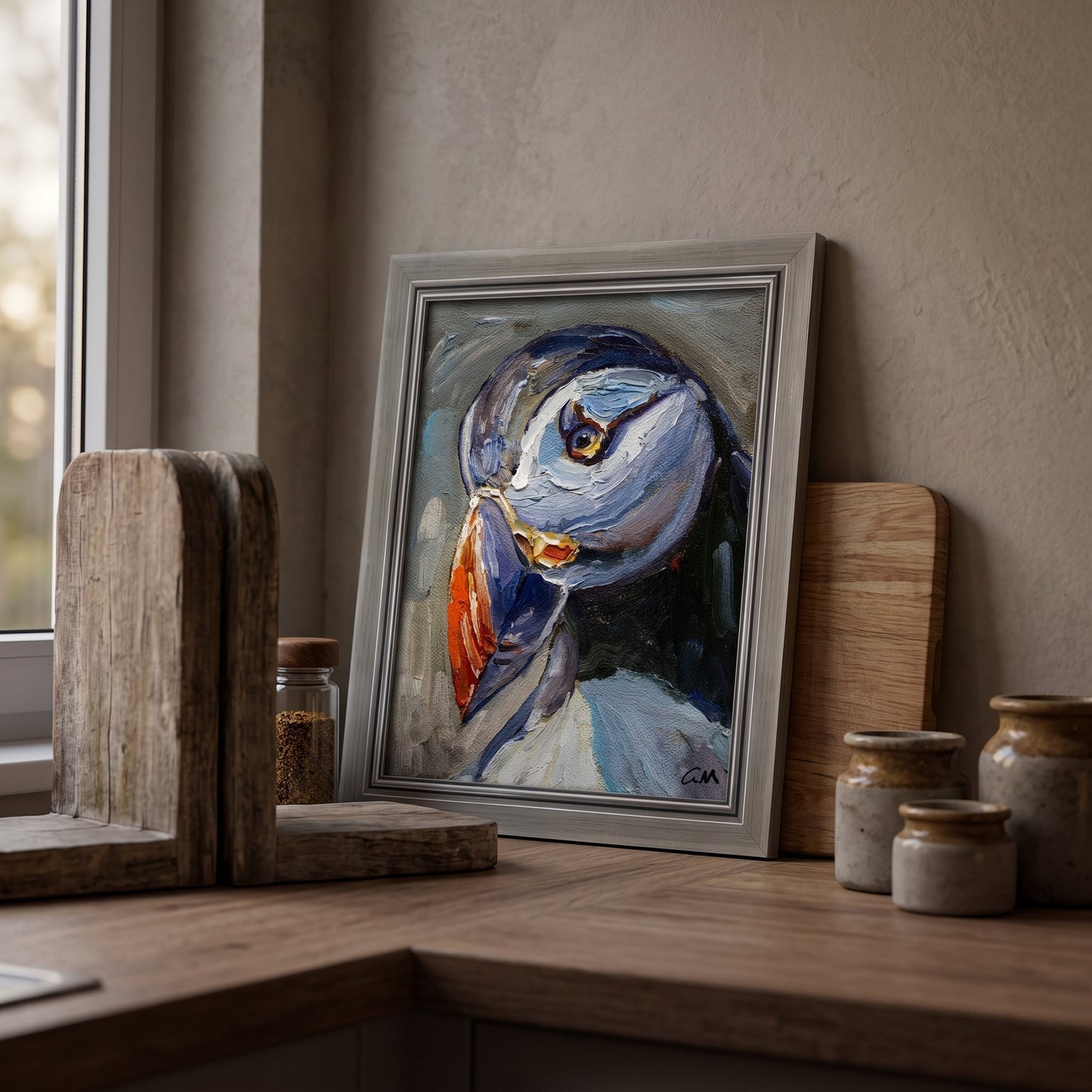 Rustic farmhouse kitchen — Expressive puffin painting adds vibrant color and artistic warmth to the space