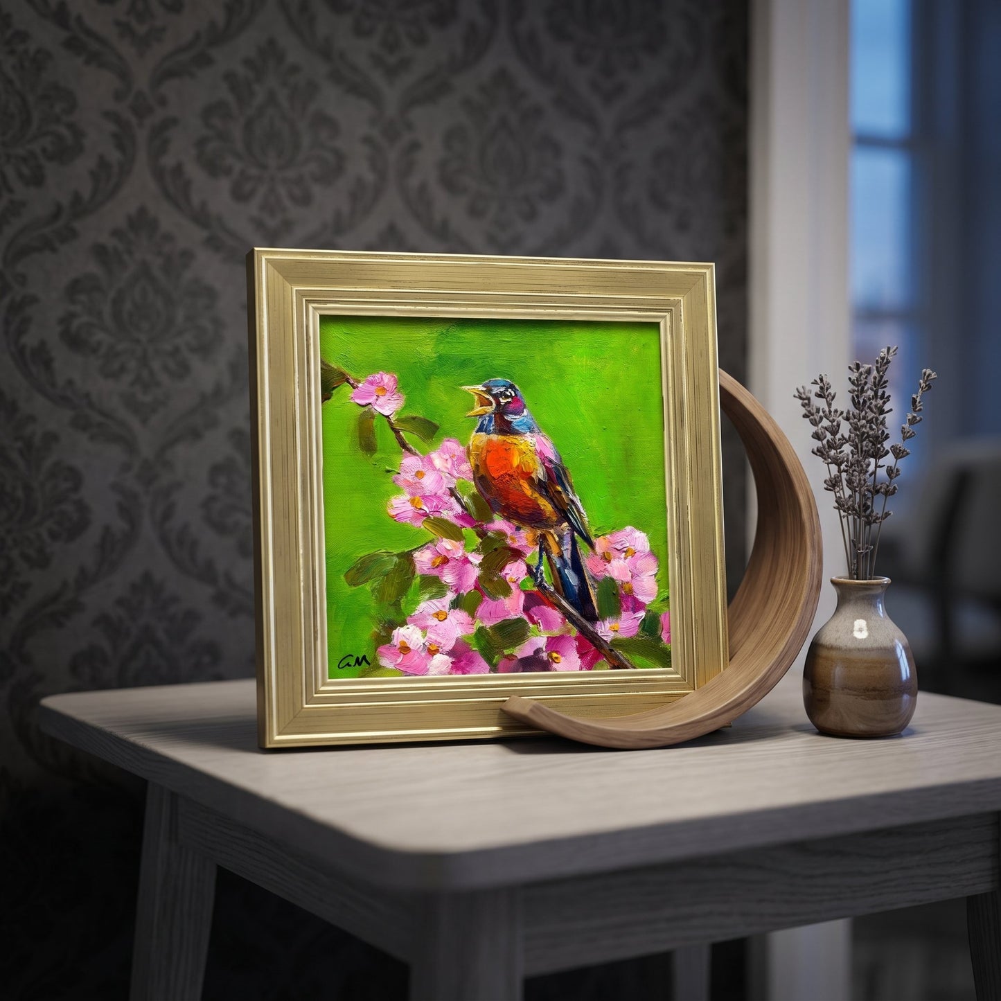 Eclectic living room — vibrant bird painting adds color and life to moody decor