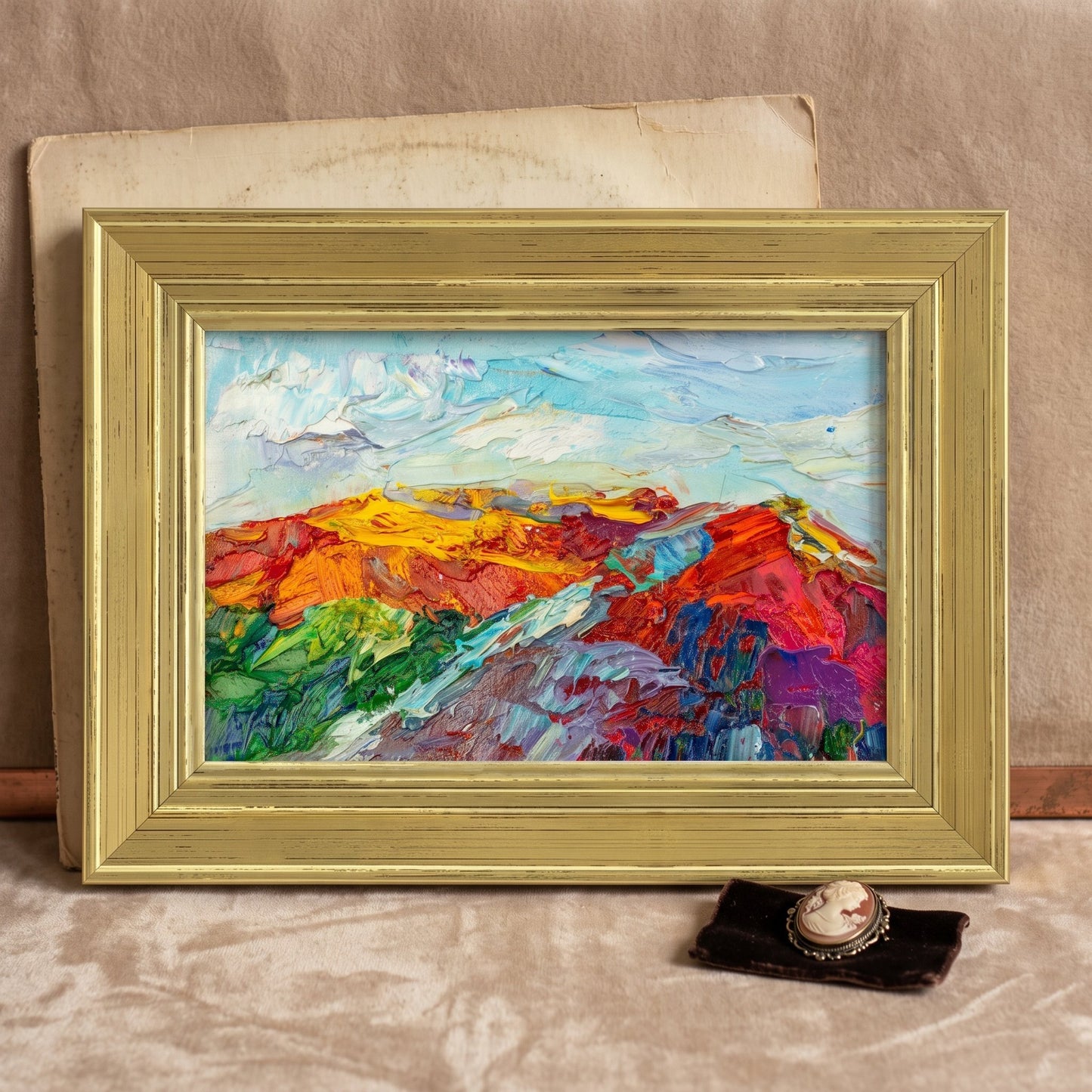 Rustic Farmhouse Living Room — Vibrant expressionist landscape painting adds bold color and emotional depth to a warm, earth-toned space